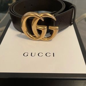 Gucci GG leather belt.